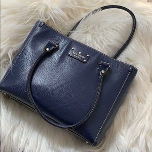 Kate Spade navy purse with pink/white interior